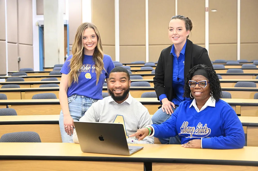 ASU students posing with professor