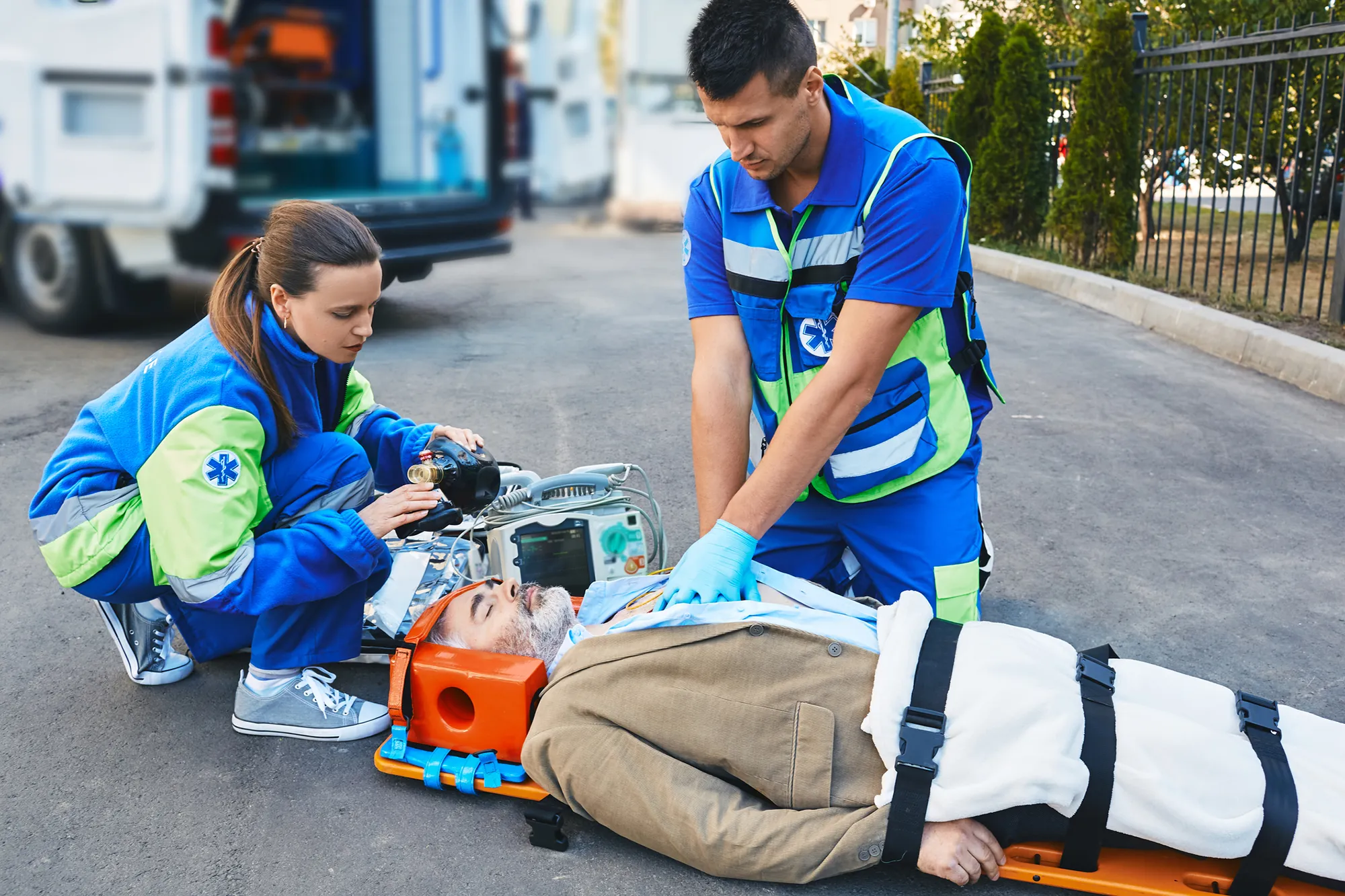 EMT performing cardiac life support